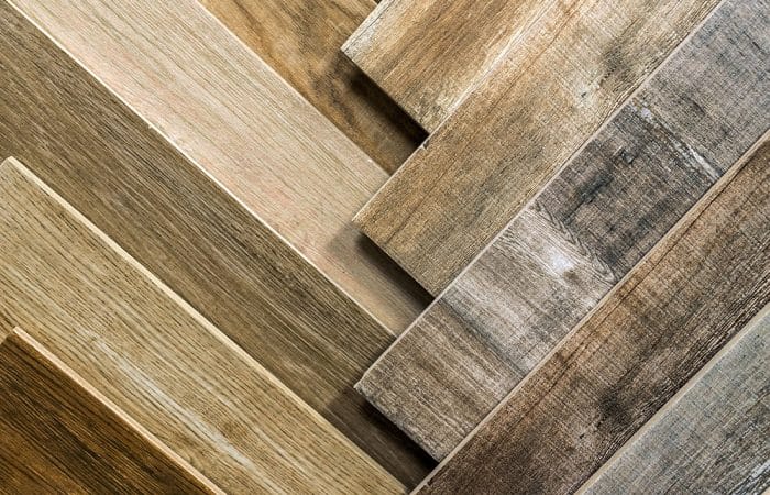 Variety of wooden like tiles. Samples of fake wood tiles for flo